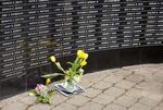 The names of those Oregonians who died during the Vietnam War were read Monday at the memorial at Portland's Washington Park.