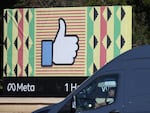 A sign in displayed in front of Meta headquarters in Menlo Park, Calif., on Feb. 2. Meta, Facebook's parent company, reported a 1% decline in revenue in the most recent quarter.