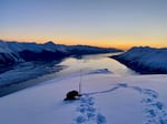 OSU doctoral student Christina Aragon measures snow depth and snow density in Alaska.