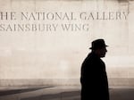 A person walks by the Sainsbury Wing of the National Gallery, London.