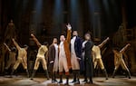 At center, left to right, Elijah Malcomb as John Laurens, Joseph Morales as Alexander Hamilton, Kyle Scatliffe as the Marquis de Lafayette and Fergie L. Philippe as Hercules Mulligan in the second national tour of "Hamilton."