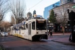 A MAX light rail train travels through downtown Portland on Nov. 20, 2019. 