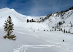 FILE - A backcountry skier on the east side of Mount Hood in Oregon, Jan. 16, 2024.