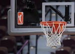 FILE - The WNBA logo and hoop are seen at a WNBA basketball game at Mohegan Sun Arena, Tuesday, May 14, 2019, in Uncasville, Conn.