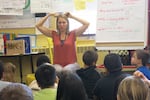Earl Boyles Elementary School 3rd grade teacher Nicole Rauch McGowan has students "turn off their math brains" to do a writing lesson.
