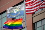 FILE - Flags fly outside of Vancouver City Hall, in Vancouver, Wash., June 29, 2024. 