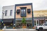 A building in downtown Albany, Ore., makes use of upper floor housing.