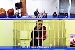 US basketball player Brittney Griner, who was sentenced to nine years in a Russian penal colony in August for drug smuggling, is seen on a screen via a video link from a remand prison during a court hearing to consider an appeal against her sentence, at the Moscow regional court on Oct. 25.