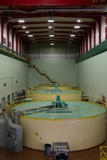 Three generator turbines powered by Lookout Point Dam in Lowell, Ore., on July 19, 2023. Housed at the bottom of the dam, these turbines contribute 143 megawatts of energy to Oregon communities when fully operational. They are controlled and monitored to respond to energy spikes and valleys that occur every hour of the day.