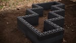 With giant Lego-like blocks made out of recycled plastic, you can design your own raised bed.