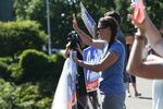 U.S. Rep. Jaime Herrera Beutler, R-Battle Ground, waves to drivers on Interstate 5 ein Vancouver on Aug. 2, 2022. The seven-term congresswoman faces multiple challengers in the primary, including conservatives who launched their campaigns after she voted to impeach former president Donald Trump.