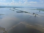 Heavy rains in recent days have submerged farmland near Vermillion, S.D., on Tuesday. Flooding has devastated communities in several states across the Midwest.