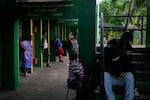 People take shelter at a school ahead of Hurricane Melissa's forecast arrival in Old Harbour, Jamaica, Monday, Oct. 27, 2025.