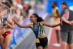 Weini Kelati celebrates after winning the women's 10,000-meter final during the U.S. Track and Field Olympic Team Trials Saturday, June 29, 2024, in Eugene, Ore.