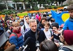 Mayor Ted Wheeler received the demands of the student activists after they marched to Terry Shrunk Plaza across from City Hall.