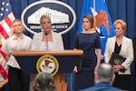 Attorney General Pam Bondi spoke at the Justice Department on Wednesday to announce that the administration is suing Maine for not complying with the government's push to ban transgender athletes in girls sports. She was accompanied by (from left) Riley Gaines, Rep. Laurel Libby, R-Maine, and Education Secretary Linda McMahon.