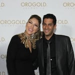Adi Sharvit Oded and Avihu Oded pose for a picture at an Orogold Cosmetics event in 2014. 