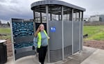 Sarah Koski stands outside a modern restroomdemmed the Portland Loo on March 10, 2026.