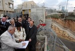 Nobel Peace Prize laureate Navi Pillay, then U.N. High Commissioner for Human Rights, visits a Palestinian family home near Ramallah in the Israeli-occupied West Bank on Feb. 7, 2011.