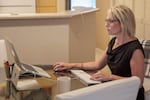 Susie Strangfield, former chief information officer for Oregon Department of Education, in her apartment. 