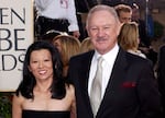 Actor Gene Hackman and his wife, Betsy Arakawa, arrive in January 2003 at the 60th Annual Golden Globe Awards in Beverly Hills, Calif.