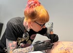 ‘At Work With’: Oregon tattoo artist helps people heal from trauma with tattoos