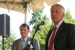 Mayor Charlie Hales (right) announces a new mixed-use development in Northeast Portland, with Commissioner Dan Saltzman.