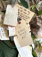 A hand written wish tied to the Wishing Tree on the corner of NE Morris Street and 7th Avenue in Portland, Ore on July 11, 2025.