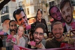 Relatives and supporters of Israeli hostages held by Hamas in Gaza display photos of the captives during a protest demanding their release. in Tel Aviv, Israel, on Saturday, June 21, 2025.