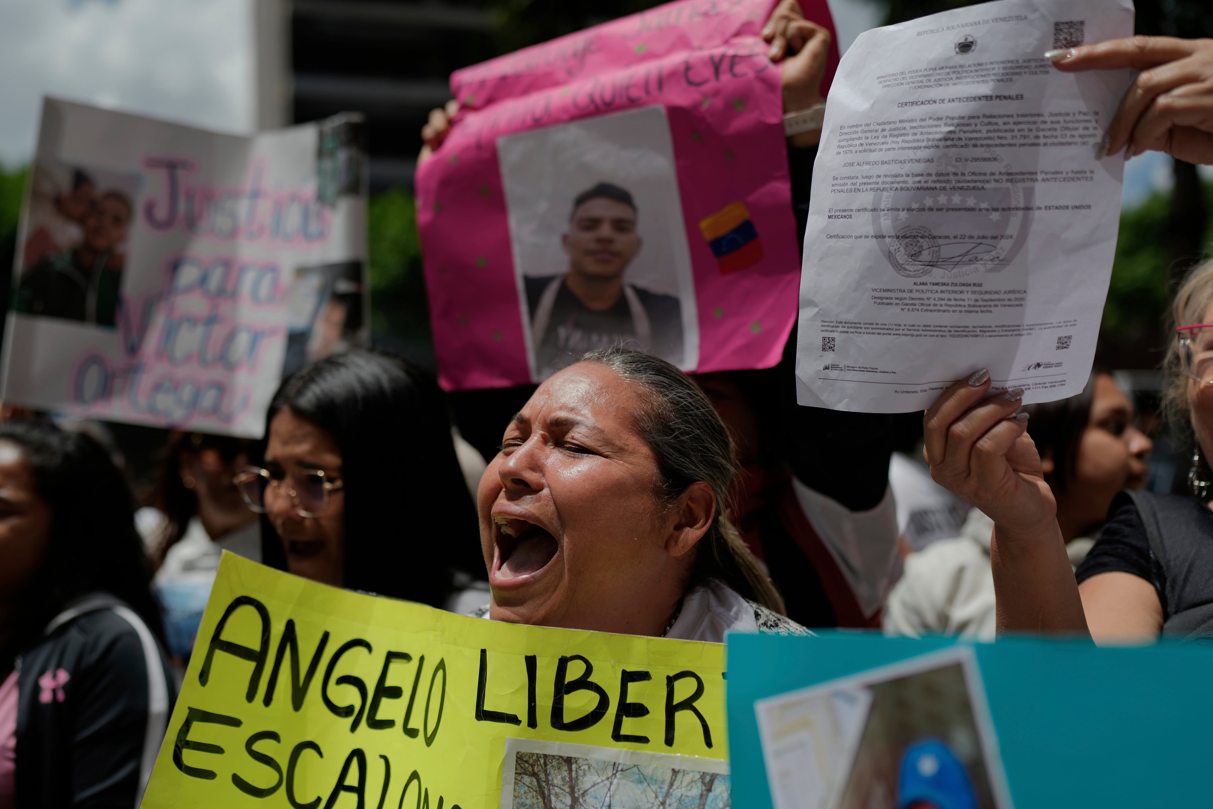 The relatives of Venezuelan migrants in the U.S. who were flown to a prison in El Salvador by the U.S. government who alleged they were members of the Tren de Aragua gang, protest outside of the United Nations building in Caracas, Venezuela, Wednesday, April 9, 2025.