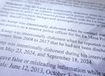 A close up of a draft report state police certification officials sent to Deschutes County Sheriff Kent van der Kamp April 14, 2025.