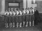 This photograph by June D. Drake from 1929, shows a girls basketball team from Mt. Angel, Oregon.