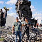 Shown are two divers with Adventures with Purpose. They started out by collecting trash from local rivers and lakes and now help solve cold cases.