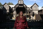 Oregon Shakespeare Festival Artistic Director Nataki Garrett stands inside the Allen Elizabethan Theatre in Ashland, Ore. She recently programmed her first full season but not everyone has embraced her new approach.