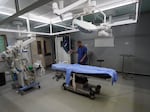 A medic stands in a surgery room at the European hospital in Khan Younis in the southern Gaza Strip on May 17, amid the ongoing conflict in the Palestinian territory between Israel and the militant group Hamas. 