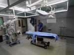 A medic stands in a surgery room at the European hospital in Khan Younis in the southern Gaza Strip on May 17, amid the ongoing conflict in the Palestinian territory between Israel and the militant group Hamas.