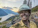 Federal wildland firefighter Rachel Granberg takes a selfie in her uniform