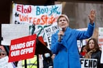 Sen. Elizabeth Warren, (D-Mass., speaks at a rally outside the Consumer Financial Protection Bureau in Washington, D.C., on Feb. 10, 2025. Dozens of CFPB workers were laid off on Tuesday, the agency's union said.
