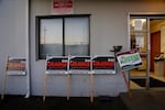 Campaign signs for Port of Vancouver Commissioner race outside the ILWU building in downtown Vancouver.