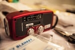 The American Red Cross recommends that each household have a hand-crank radio or other battery-powered communication device to tune in to emergency broadcasts and disaster relief messages. 