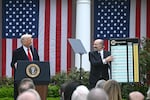 President Trump delivers remarks on reciprocal tariffs as Secretary of Commerce Howard Lutnick holds a chart during an event in the Rose Garden entitled "Make America Wealthy Again" at the White House in Washington, D.C., on April 2, 2025.