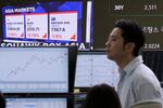 Asia markets index of Japan, South Korea and Australia is seen on a screen as a currency trader works at the foreign exchange dealing room of the KEB Hana Bank headquarters in Seoul, South Korea, Wednesday, April 9, 2025.