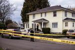 Police tape circles a crime scene in NE Portland.