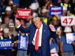 Former President Donald Trump dances to a song as he leaves a rally in Johnstown, Pa., on Aug. 30.