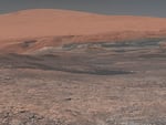 This image provided by NASA, assembled from a series of January 2018 photos made by the Mars Curiosity rover, shows an uphill view of Mount Sharp, which Curiosity had been climbing.