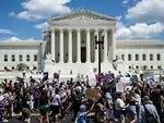 Demonstrators rally to mark the first anniversary of the US Supreme Court ruling in the Dobbs v Women's Health Organization case in Washington, DC on June 24, 2023.