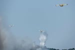 Canadair firefighting aircrafts fight a wildfire burning near Pelayos de la Presa, 65 kilometers west of Madrid, on July 26, 2026.