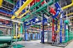 Multi-color pipes transport water around Google's data center in The Dalles to cool equipment.