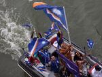 Team Marshall Islands are seen on a boat on the River Seine during the opening ceremony of the Olympic Games Paris 2024 on July 26.