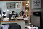 Principal Becca Bostwick takes a call in her office at Taft Elementary School in Lincoln City, in November 2018.